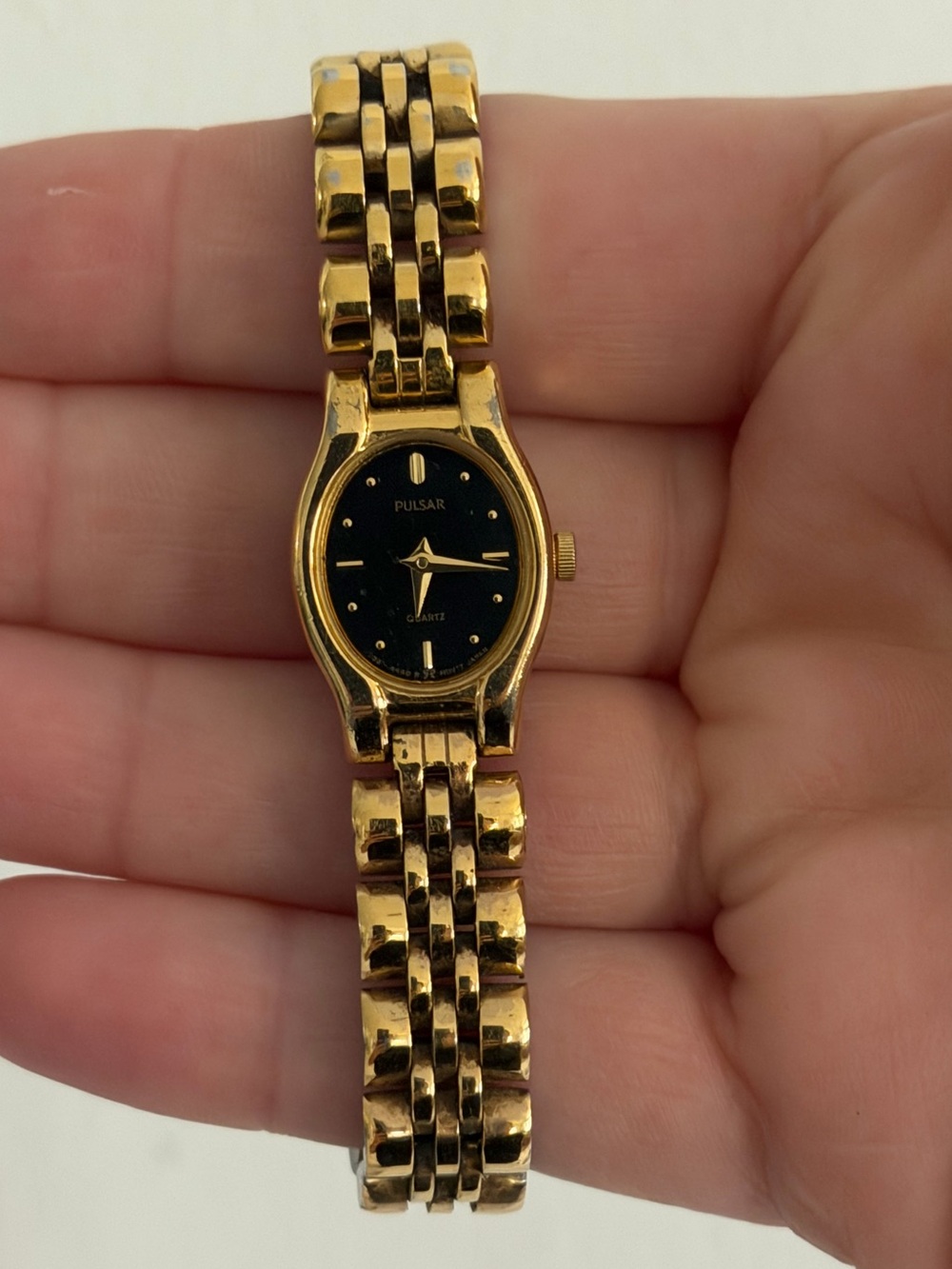 Vintage Pulsar Gold-Tone Watch with Black Dial